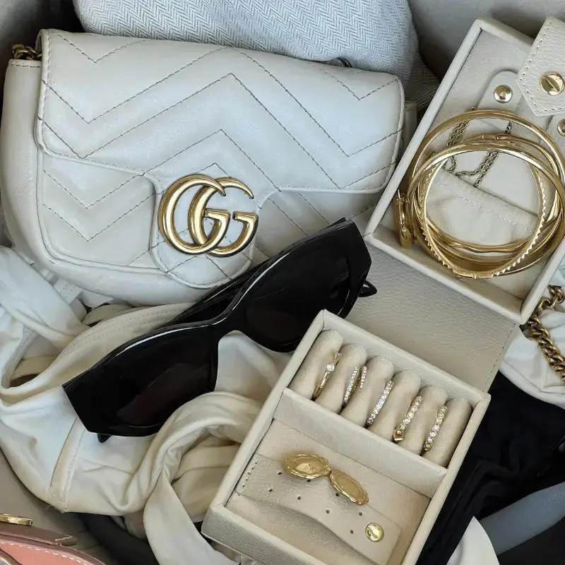 handbag with jewellery organised in jewellery box